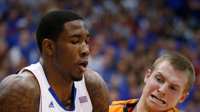 Markel Brown scored  points, Marcus Smart added  and Oklahoma State held on to upset No.